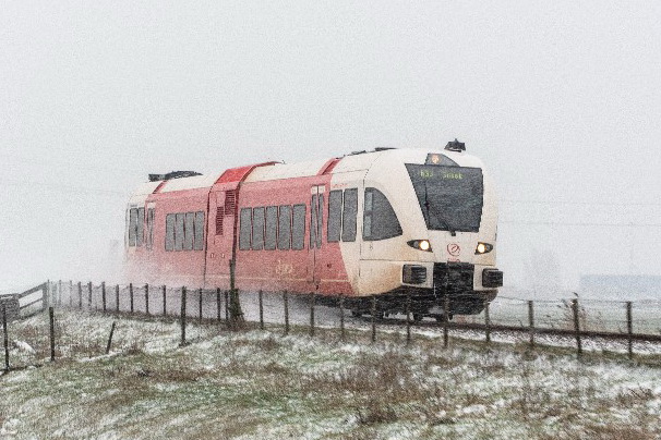 Trein%20in%20landschap%20Noordelijke%20lijnen%20sneeuw.JPG